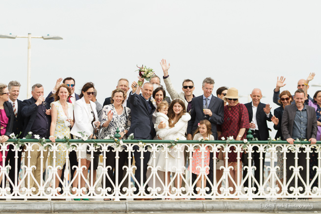 wedding guests on Brighton Bandstand bridge